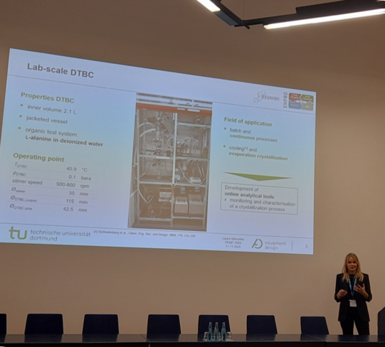 This image shows Laura Marsollek during her talk at the PEMT 2025.